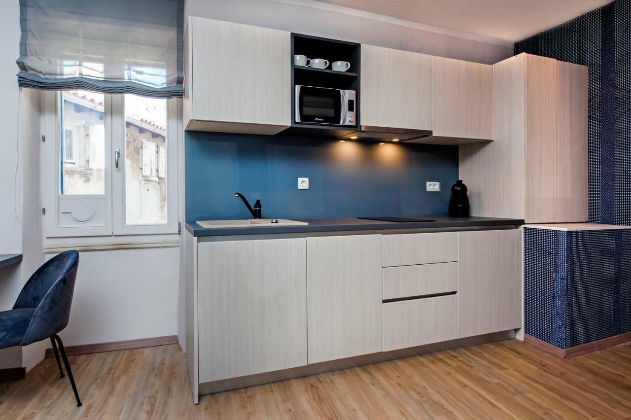 Harmony In Blue Apartment โรวีน ภายนอก รูปภาพ